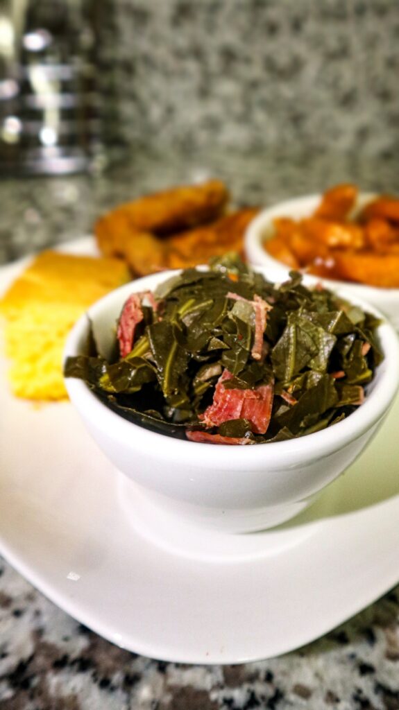 A small bowl filled with collard greens