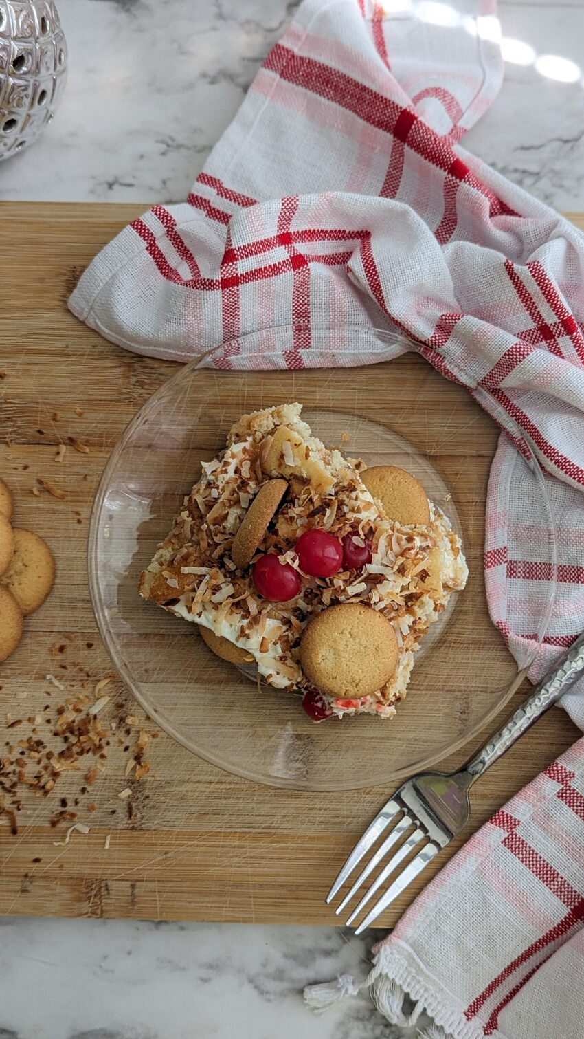 Pineapple dessert on a small plate with fork