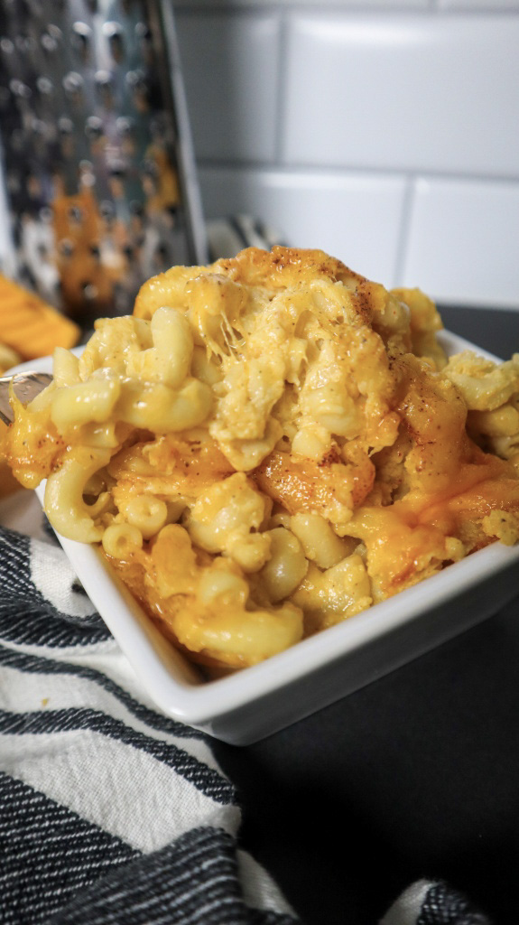 Close up photo of Southern Macaroni and Cheese in a white bowl.